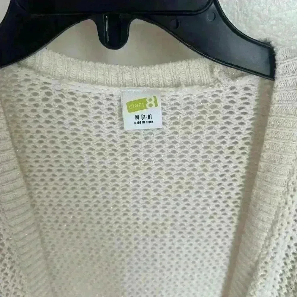 Kids knitted cardigan.